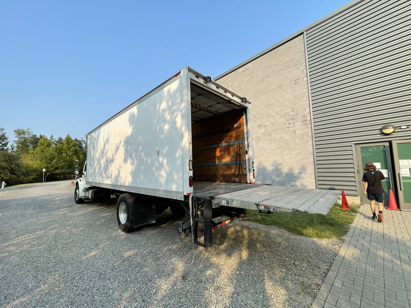 WhereWithHaul box truck with the liftgate down, ready to load